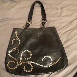 Leather bag with silver rivet detail!